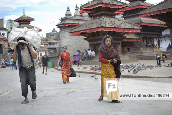 Nepalese people on Royal Palace Square or Durbar Square  Kathmandu  Bagmati  Nepal  South Asia  Asia