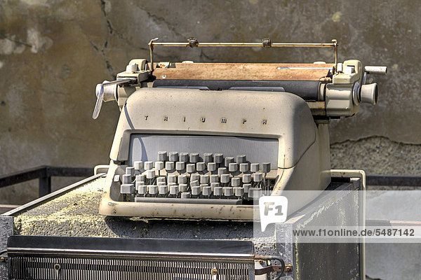 Old typewriter  in a ruinous building