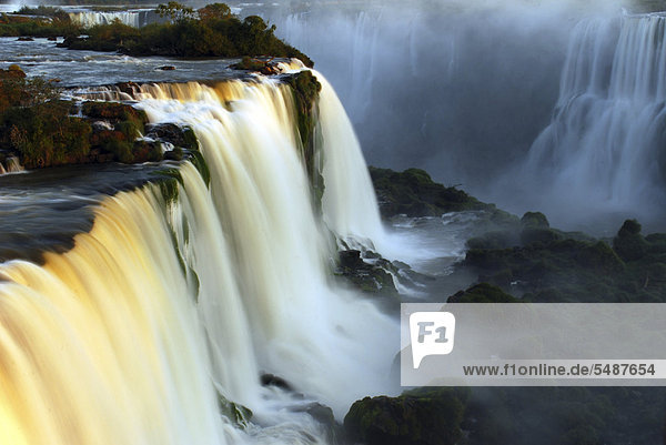 Iguacu or Iguazu Falls in the last evening light Brazilian side UNESCO World Heritage Site Iguacu National Park Brazil South America