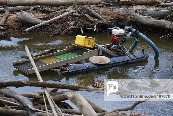 Floating work platform of a gold seeker in Amazonia Bolivia South America