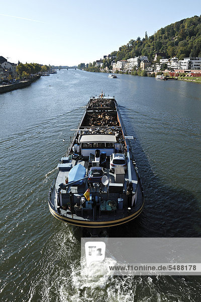 Boat transporting commercial waste on the Neckar River  Heidelberg  Baden-Wuerttemberg  Germany  Europe