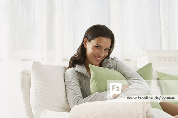 sitzend Frau Couch