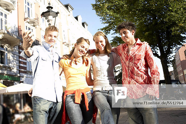 Teenagers clicking their photo.