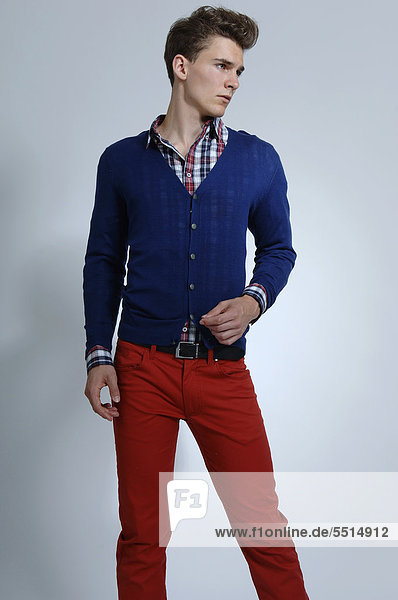 Fashion photo of a young man in colourful casual clothing