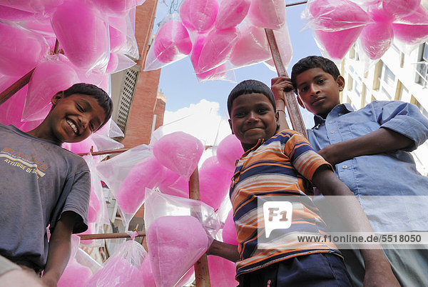 Nepalese children selling cotton candy  Kathmandu  Nepal  Asia