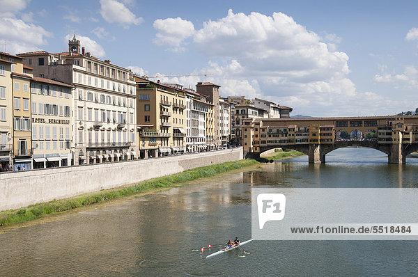 Buildings along the Arno River with the Ponte Vecchio bridge  Florence  Tuscany  Italy  Europe