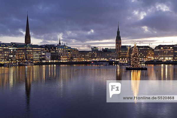 Binnenalster or Inner Alster Lake and City Hall at Christmas time  Hamburg  Germany  Europe