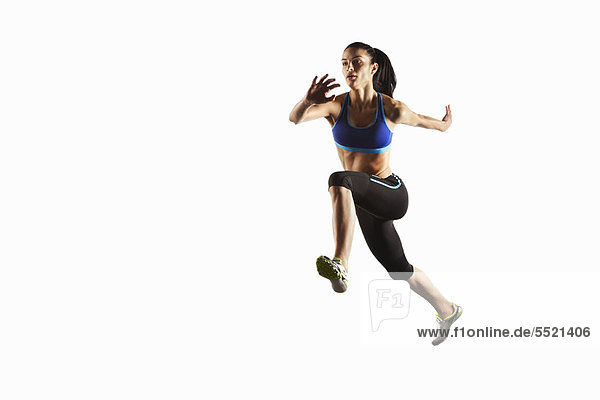 Athlete running in mid air