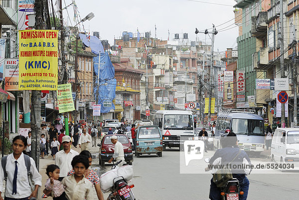Traffic  pedestrians and vehicles on the main street in Kathmandu  Nepal  Asia