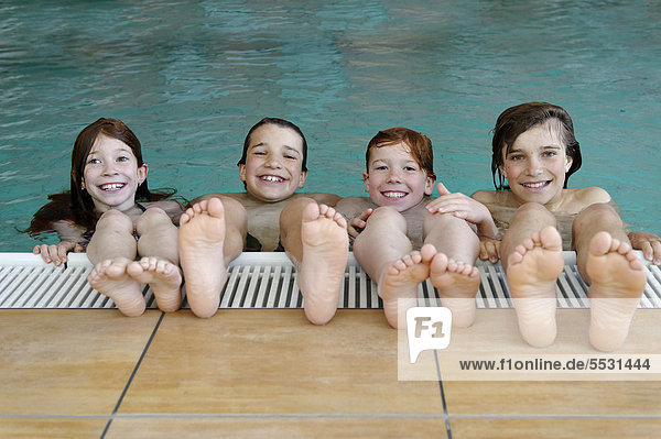 Children and teenagers in a swimming pool