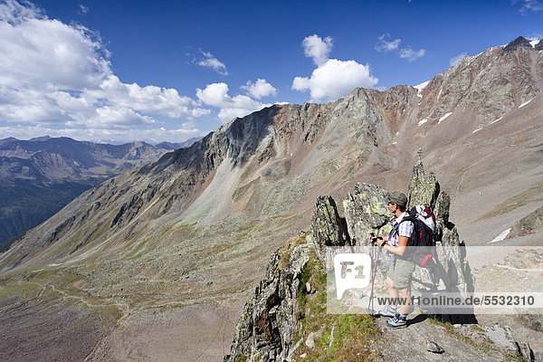 Hiker during the ascent to Similaun Hut in Schnalstal Valley via Tisental Valley  Alto Adige  Italy  Europe