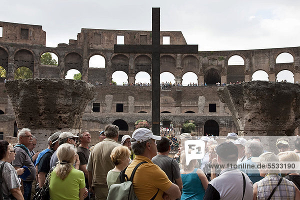 Cross at the Colosseum  tourists  Rome  Italy  Europe