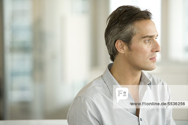 Man looking away in thought  portrait