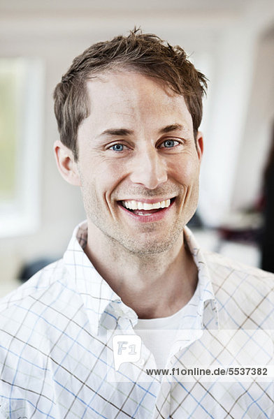 Portrait of a mid adult man smiling