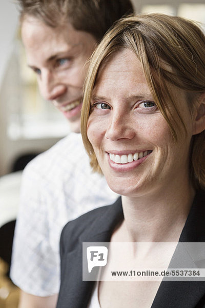 Close-up portrait of a happy mid adult couple