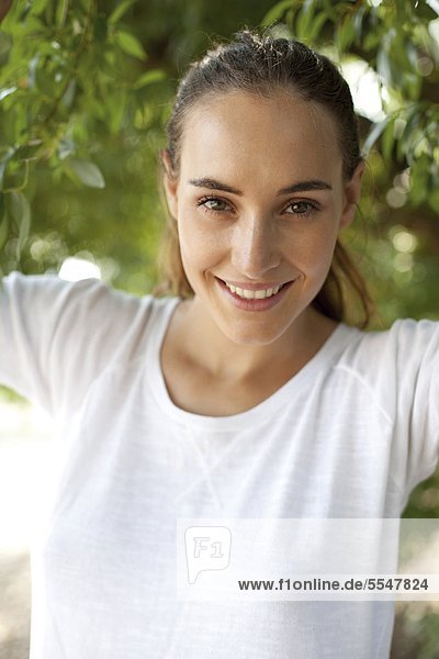 Happy young woman outdoors  portrait