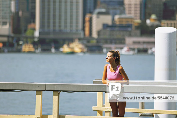 Young Woman Standing in Waterfront
