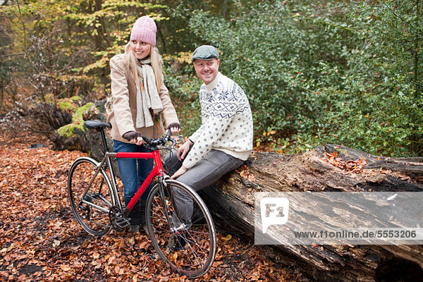 Couple in park with bike