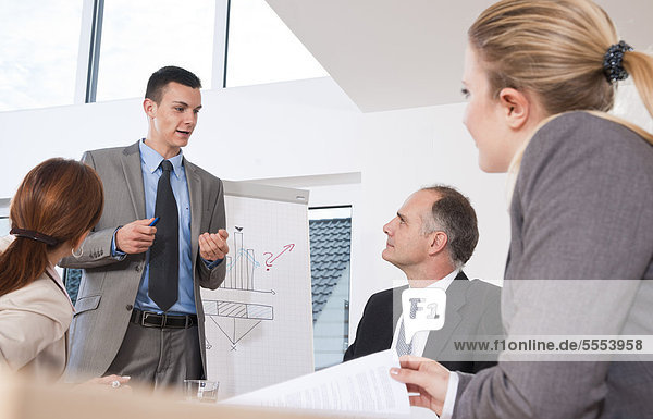 Businessman having a presentation in conference room