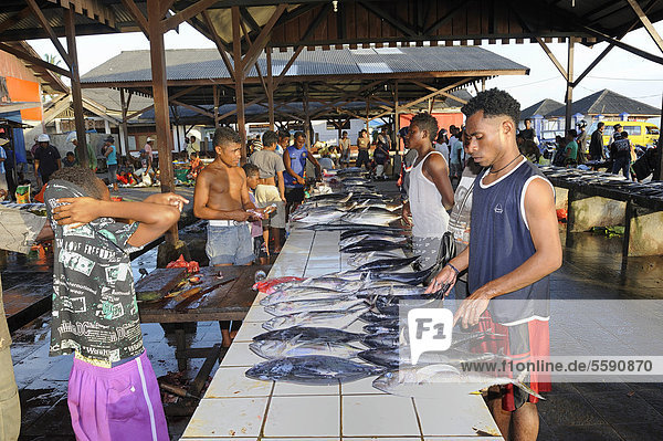 Papuan fishmongers at the fish market in Kota Biak  Biak Island  West Papua  Indonesia  Southeast Asia  Asia