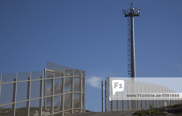 A U.S. Border Patrol surveillance tower at the international border between the United States and Mexico  San Ysidro  California  USA