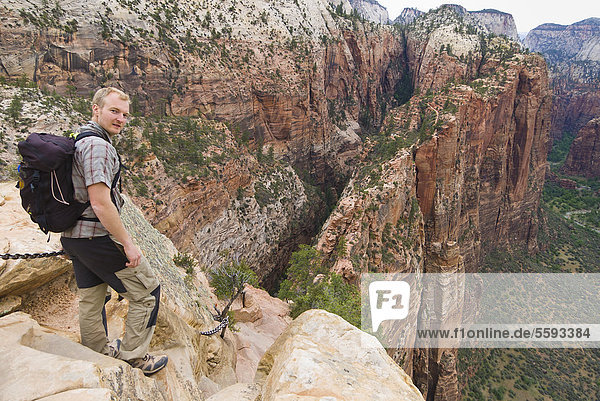 USA  Utah  Young man at Angels Landing in Zion National Park  portrait