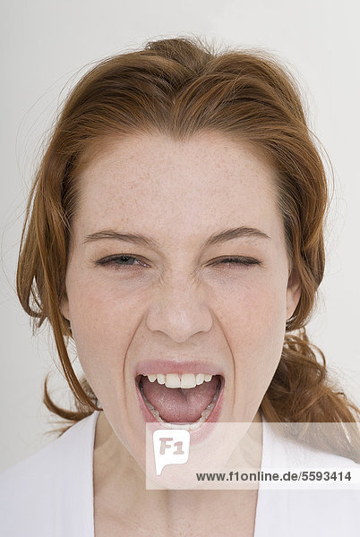 Young woman screaming  close up