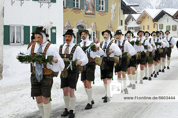 Men with bells  traditional carnival costumes  carnival parade  Maschkera  Mittenwald  Werdenfelser Land  Upper Bavaria  Germany  Europe