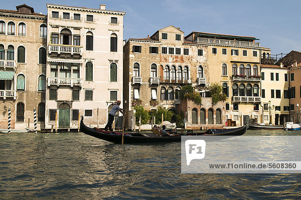Gondola on the Grand Canal  in front of hotels and palaces  Venice  Veneto  Italy  Europe