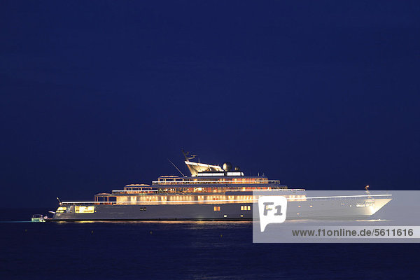 'Motor yacht ''Rising Sun''  138m  at night  built by Luersson Yachts in 2004  owned by David Geffen  previously owned by Larry Ellison  CÙte d'Azur  France  Mediterranean  Europe'