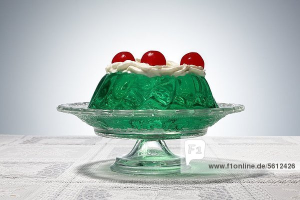 Jelly with cream and cherries