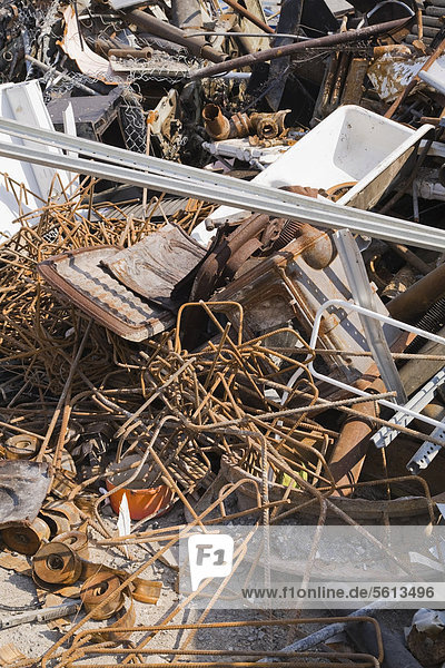 Pile of discarded industrial items at a scrap metal recycling centre  Quebec  Canada