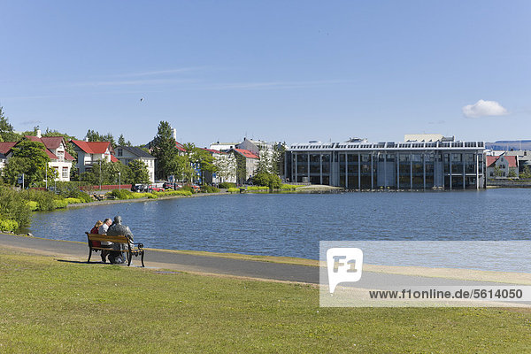 Tjoernin Lake with the town hall and mansions  Reykjavik  Iceland  Northern Europe  Europe