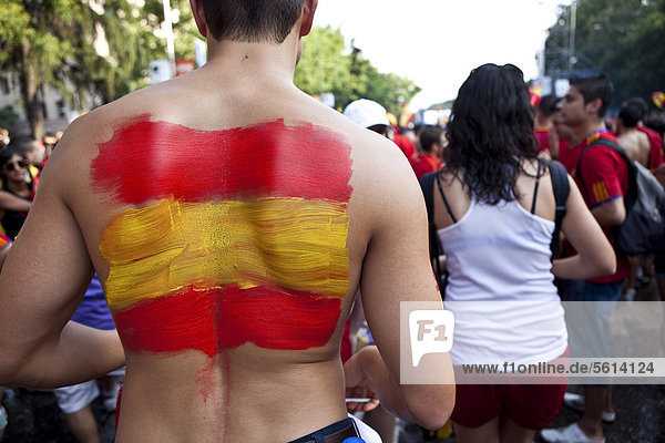 Spanish flag painted on man's back  2010 FIFA World Cup Final  Madrid  Spain  Europe