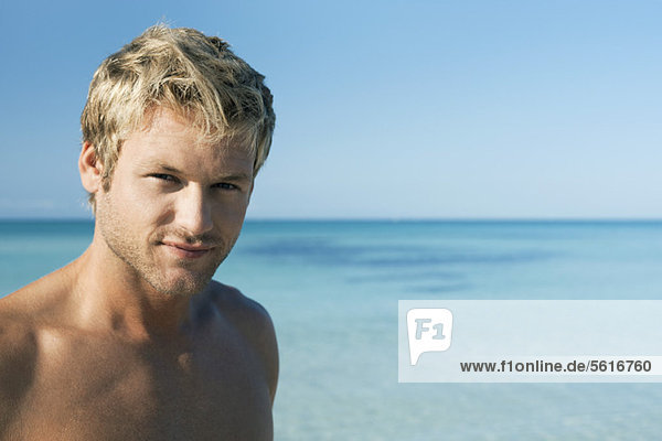 Young man on beach  portrait