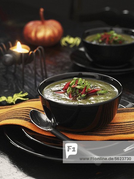 Green cream of vegetable soup at Halloween