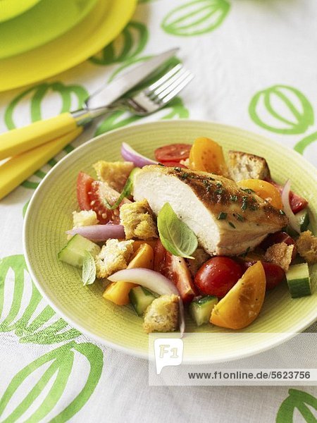Grilled chicken breast on Tuscan bread salad