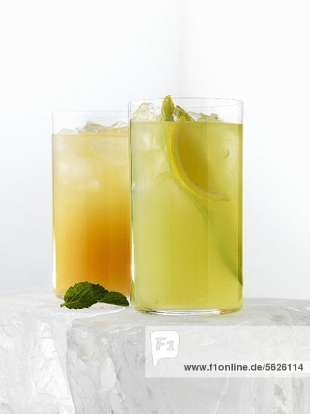 Two citrus fruit drinks