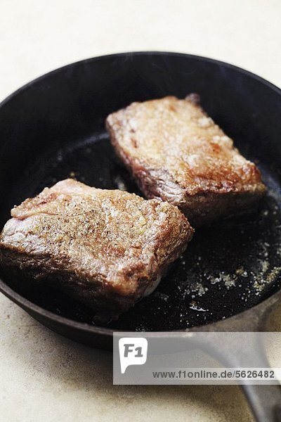 Beef Short Ribs in a Cast Iron Skillet