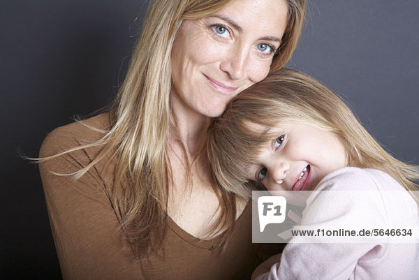 A mother and her young daughter  portrait