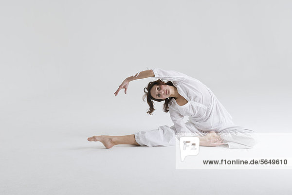 Mid adult woman doing exercise