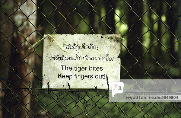 Sign warning of snappish Tiger  Luang Prabang  Laos  Southeast Asia  Asia
