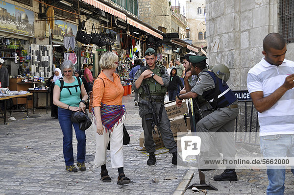 Tourists talking with soldiers Old City of Jerusalem Israel Middle East Southwest Asia