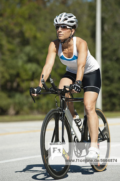 Woman riding road bike