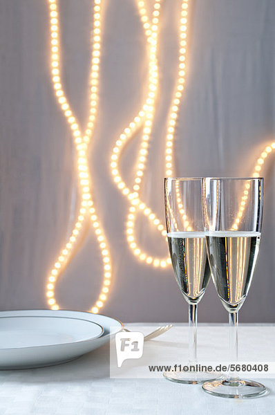 Glasses of champagne on table at an event