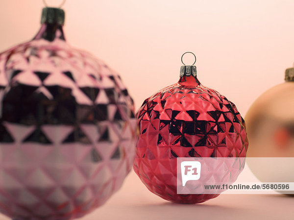 Pink and red Christmas baubles