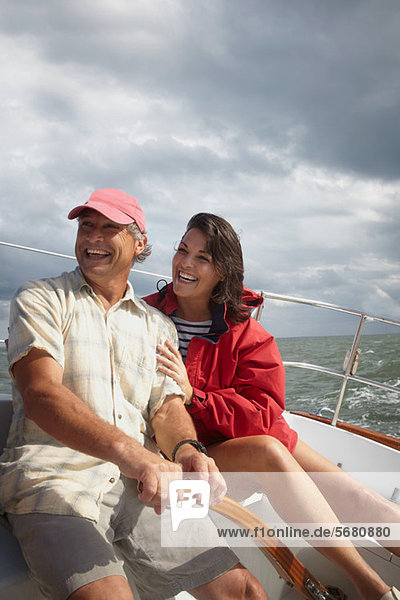 Mature couple sailing