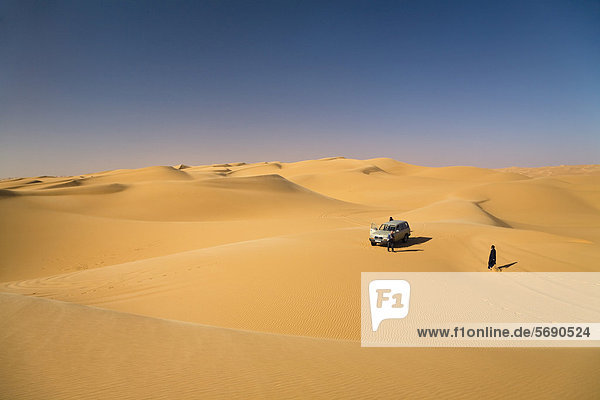 Jeep in the sand desert  Libya  Sahara  Africa
