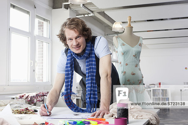 Germany  Bavaria  Munich  Fashion designer working  portrait