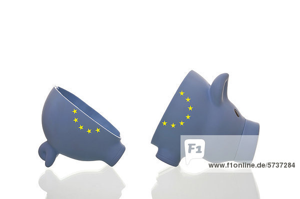 Geteiltes Sparschwein mit Europasternen  Symbolbild
